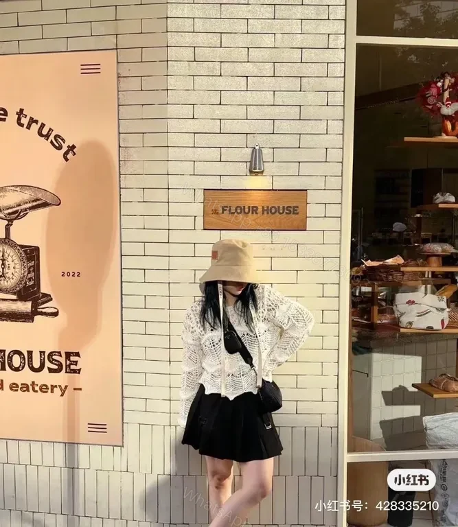 View 4 of Beige Cotton Bucket Hat with LOEWE Patch - Luxury Streetwear