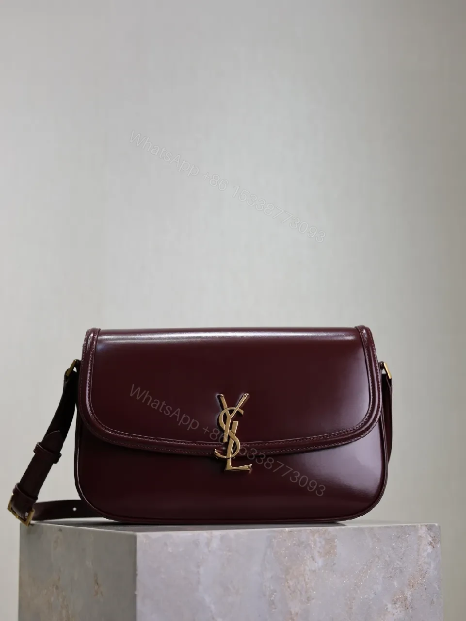 Structured Burgundy Leather Crossbody: Gold Logo, Modern Chic — view 1