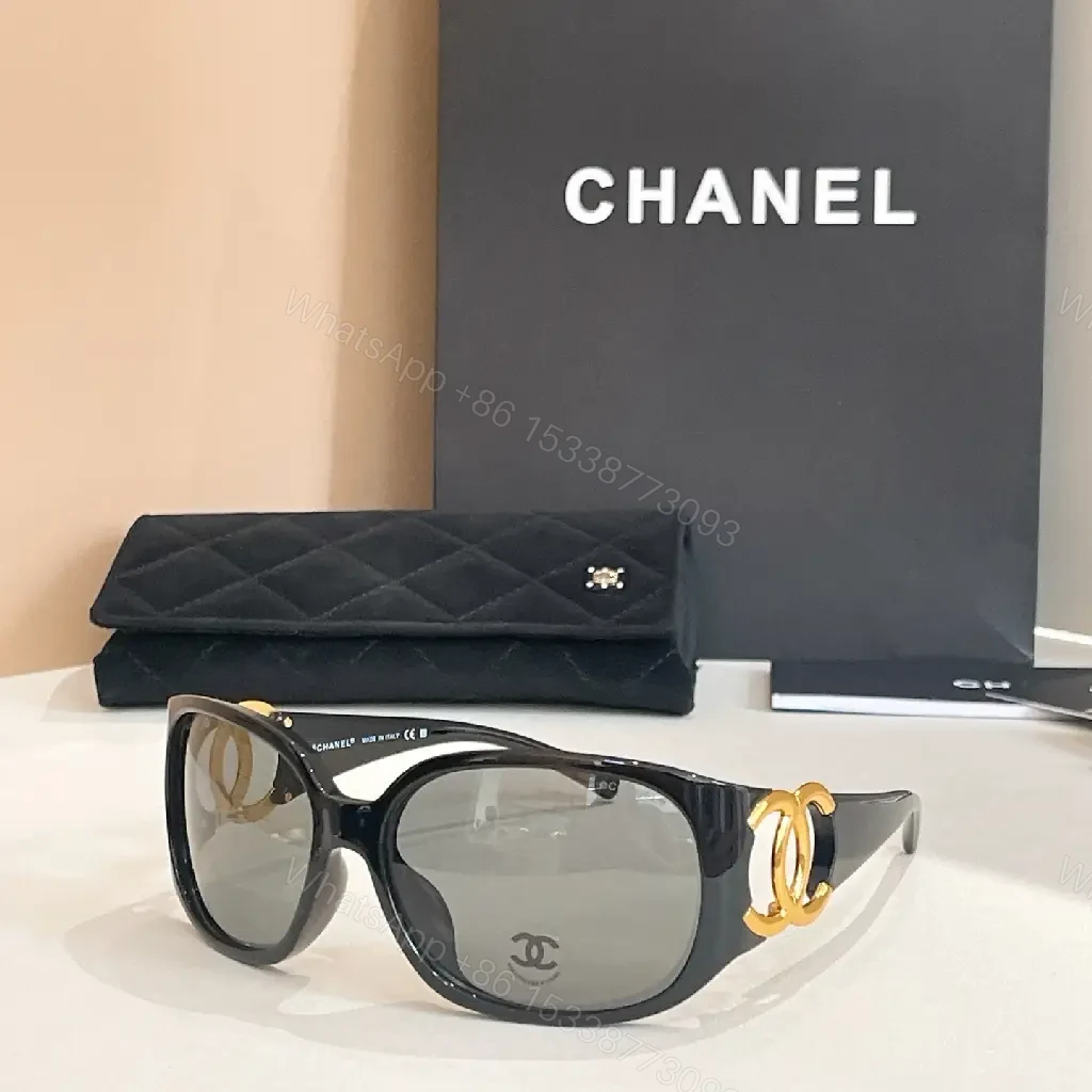 Oversized Black Luxury Sunglasses with Gold Logo Details — view 1