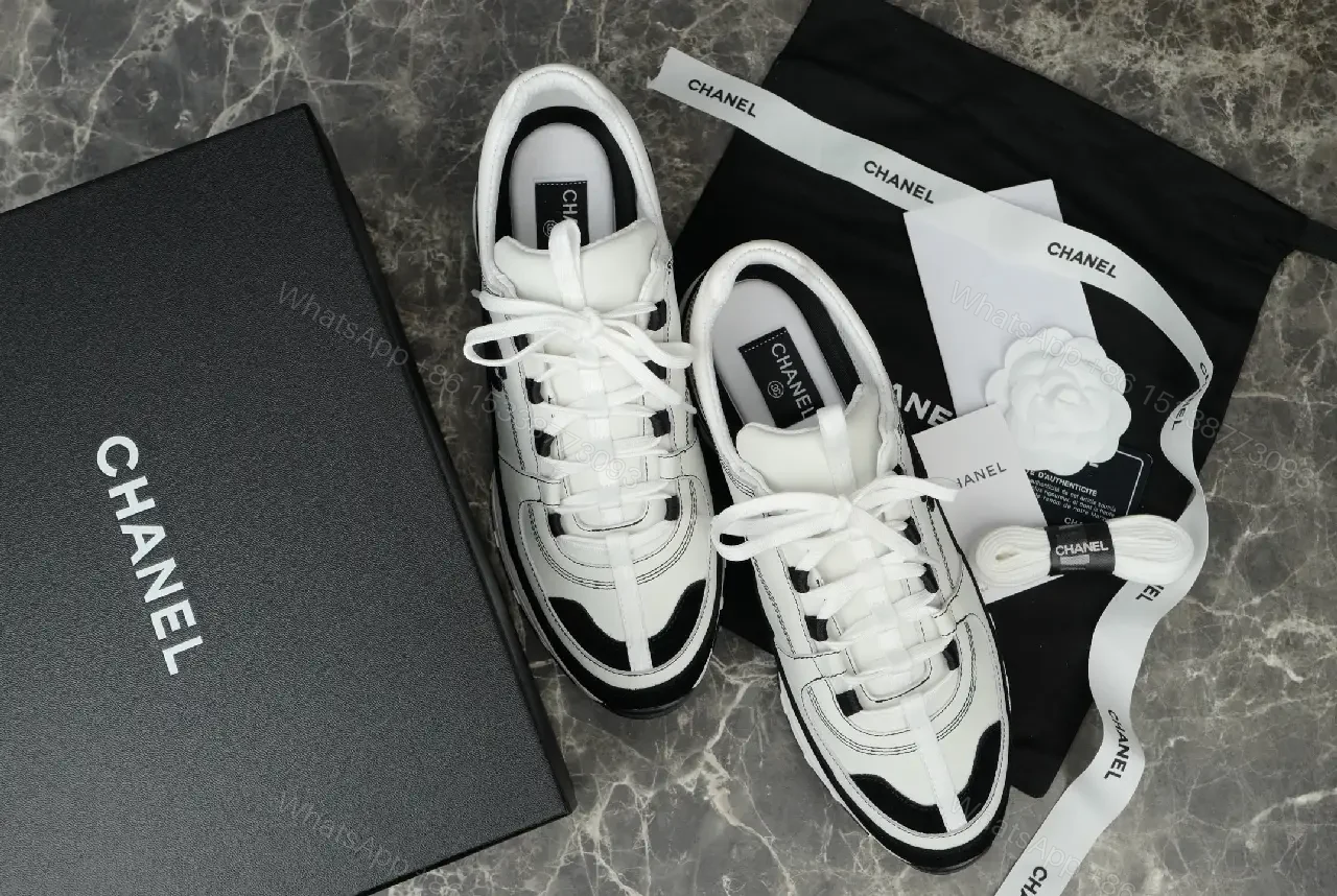 View 9 of White Leather Chunky Sneaker with Chanel Logo Details