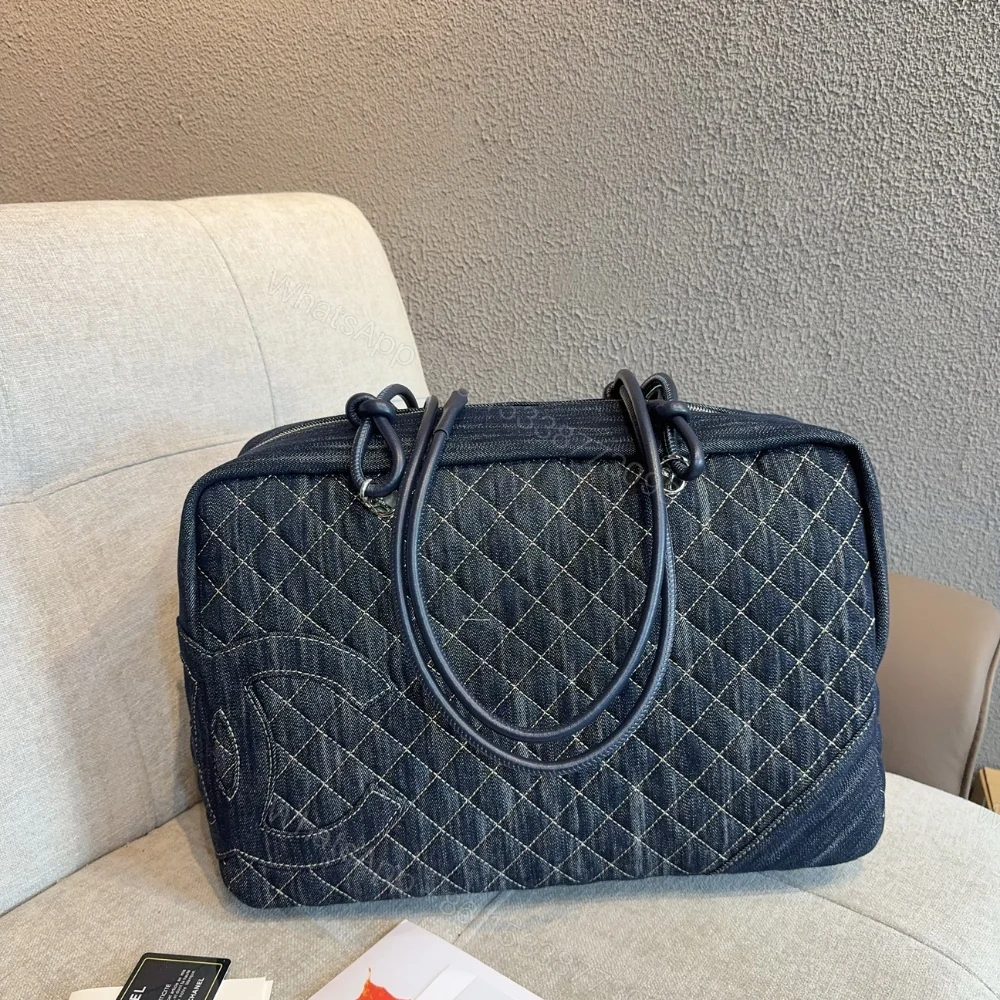 View 2 of Chanel Denim Duffle Bag Blue Denim 40Cm