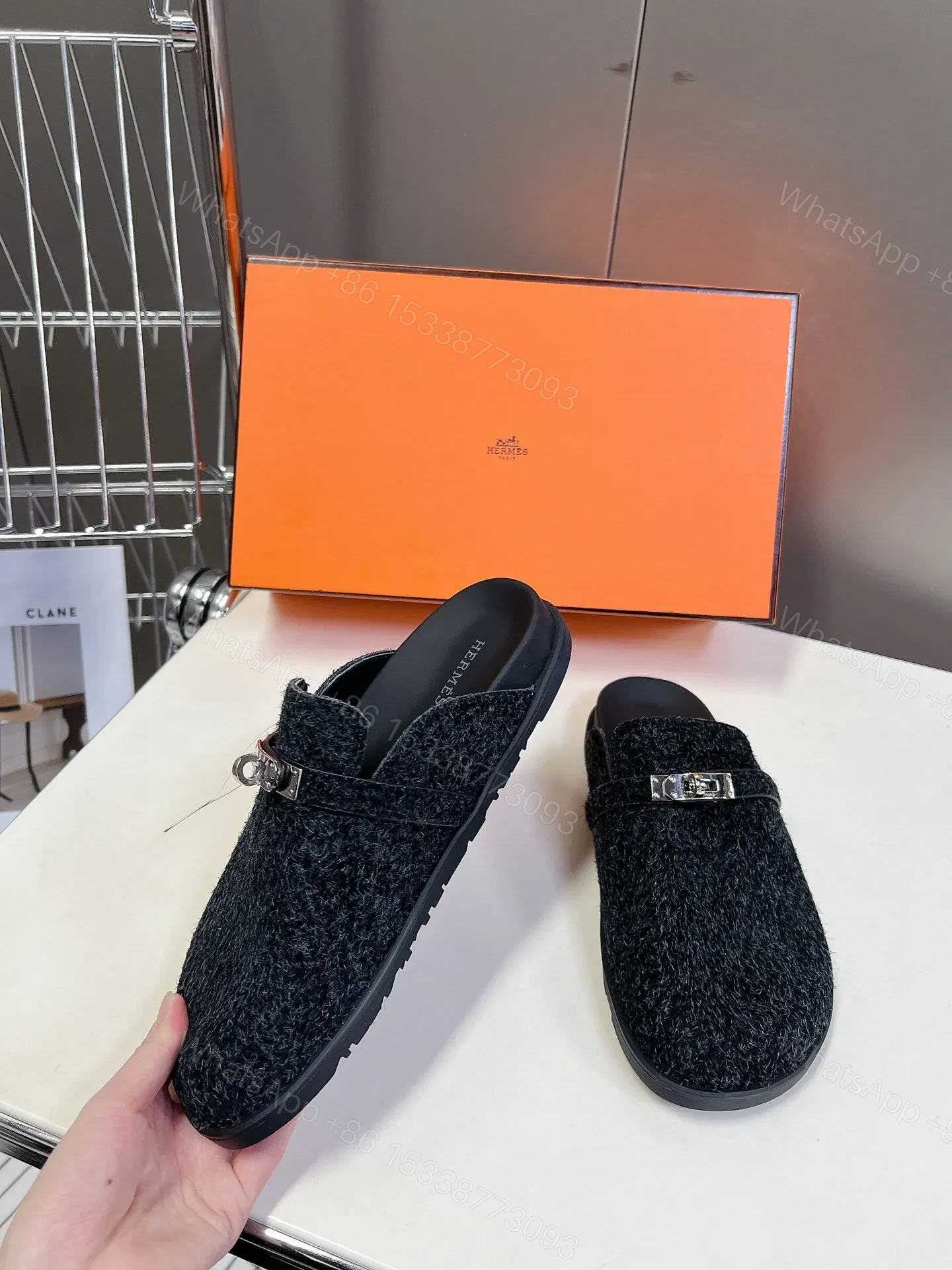 View 3 of Hermes Women Black Fuzzy Fabric Mules
