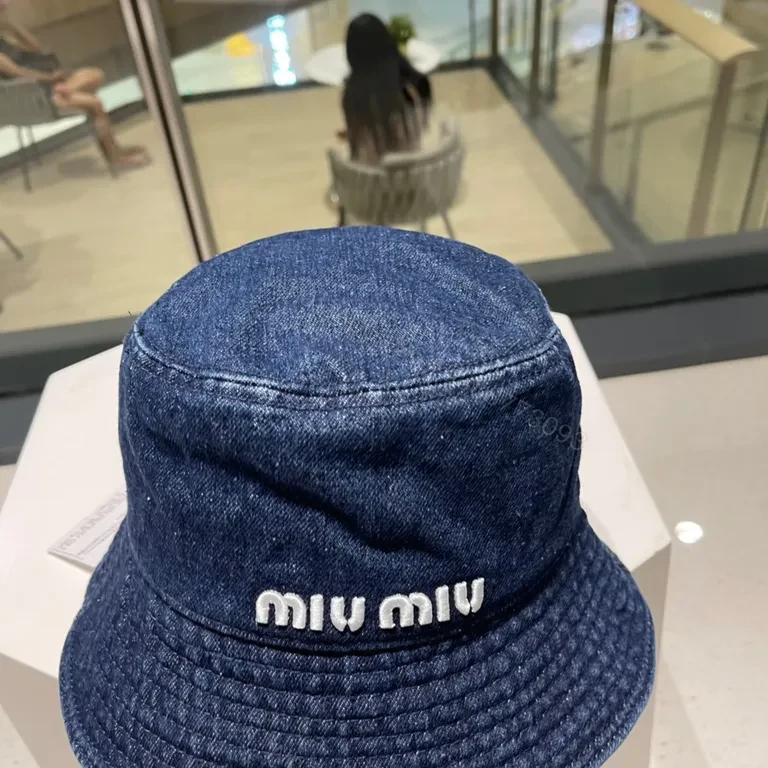 View 3 of Denim Bucket Hat: premium Miu Miu logo, casual luxe