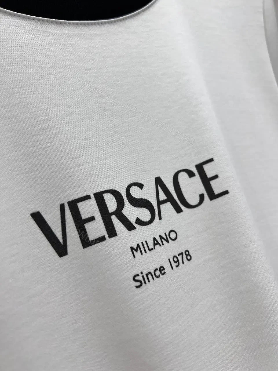 View 2 of Monochrome Versace Tee: Elevated Everyday Comfort