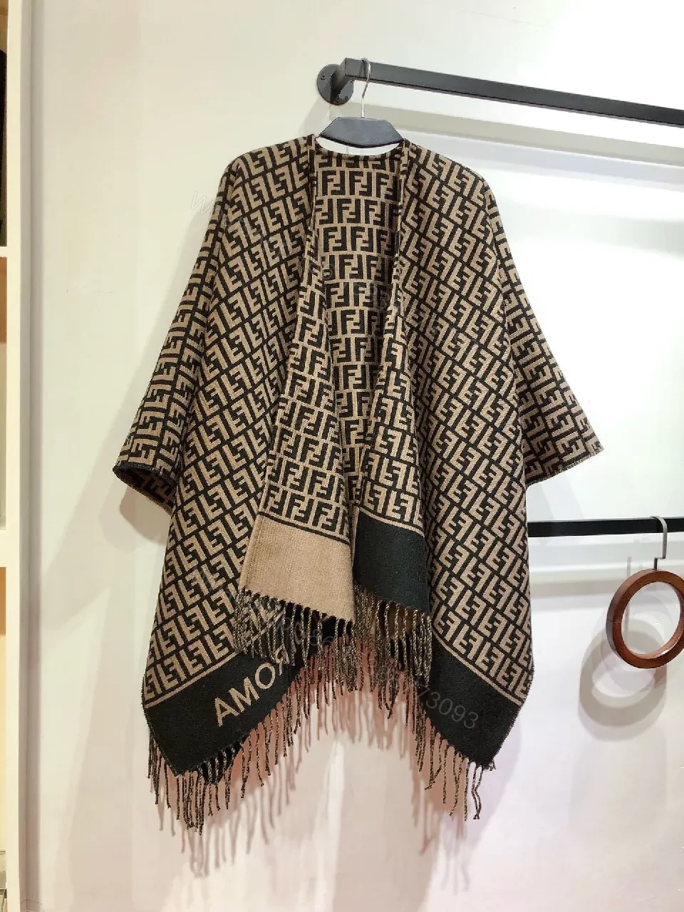 View 7 of Two-Tone Knit Poncho: Luxe Pattern & Soft Fringe