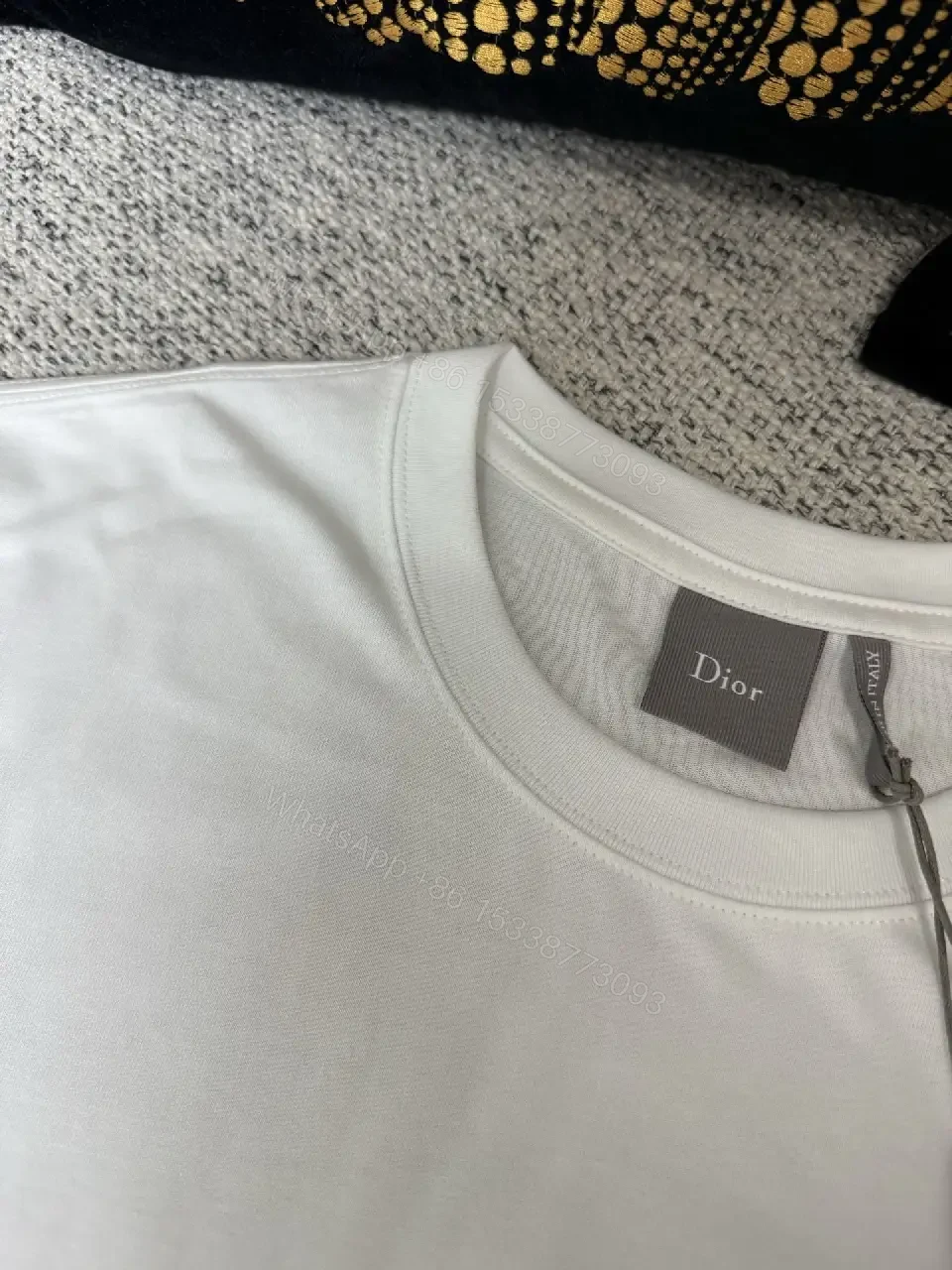 View 5 of Minimalist White Cotton Tee with Subtle Logo