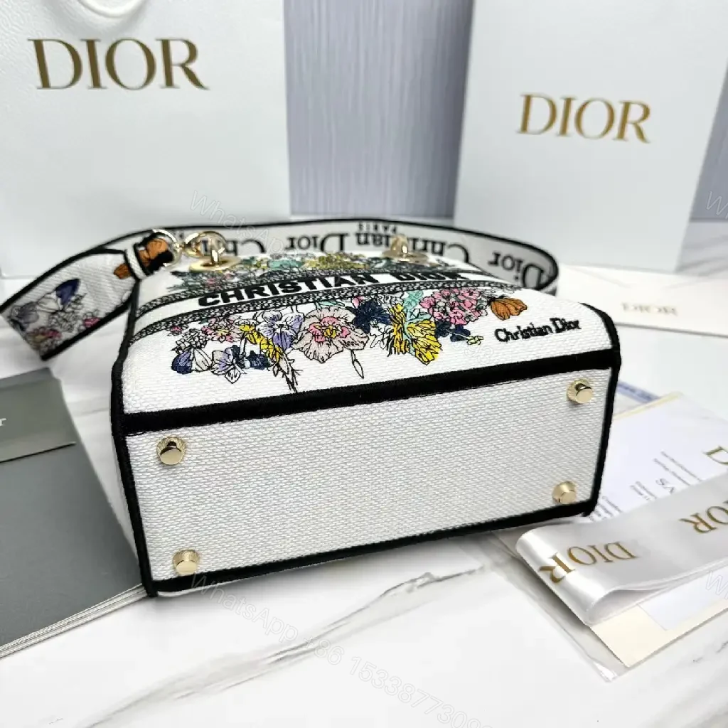 View 10 of Floral Satchel: Bold Botanical Print, Logo Band, Luxe Key Feature
