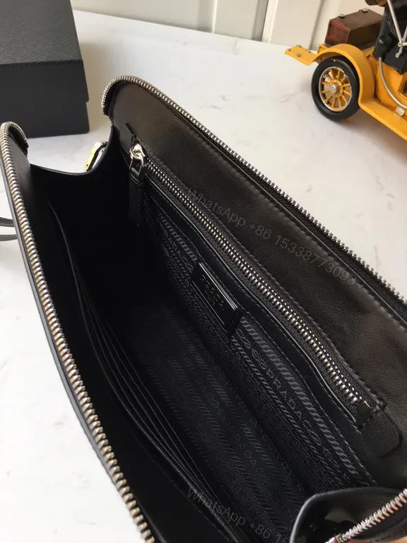 View 3 of Chic Black Saffiano Prada Clutch with Wrist Strap