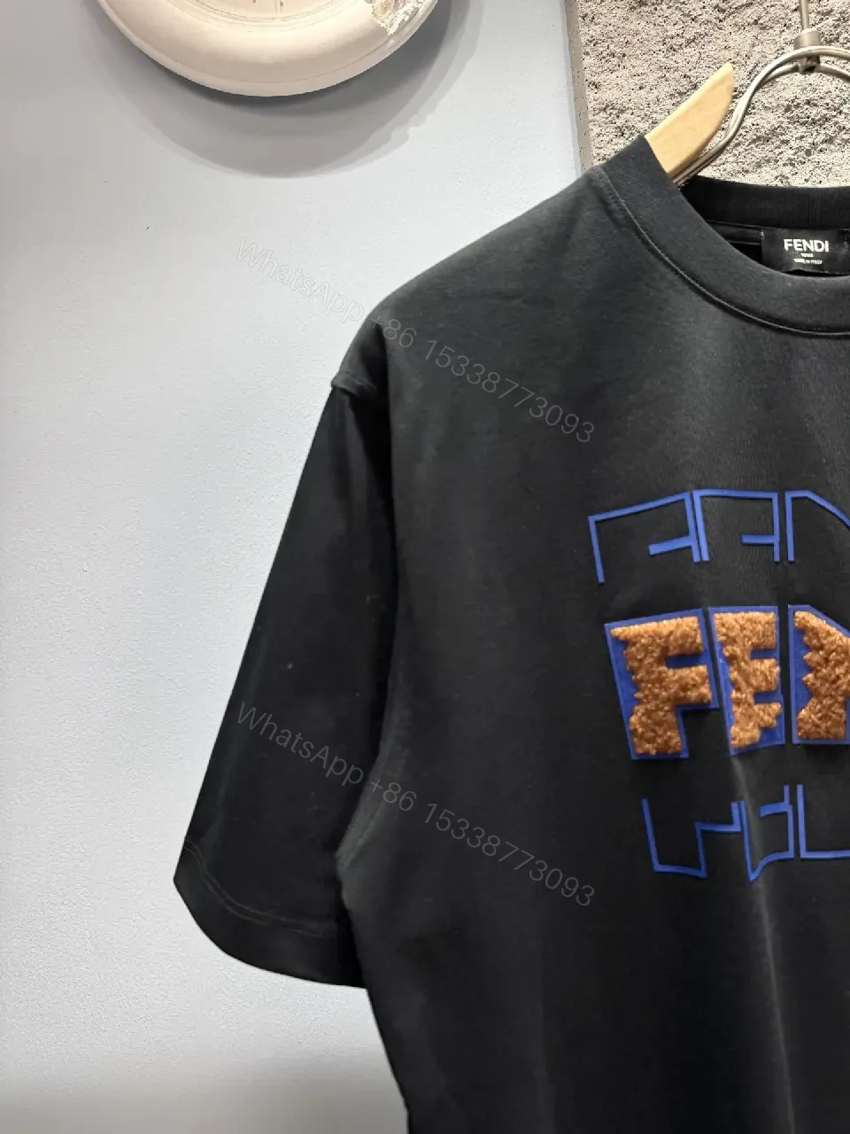 View 9 of Black Texture Logo Tee – Elevated Casual Essential Tee