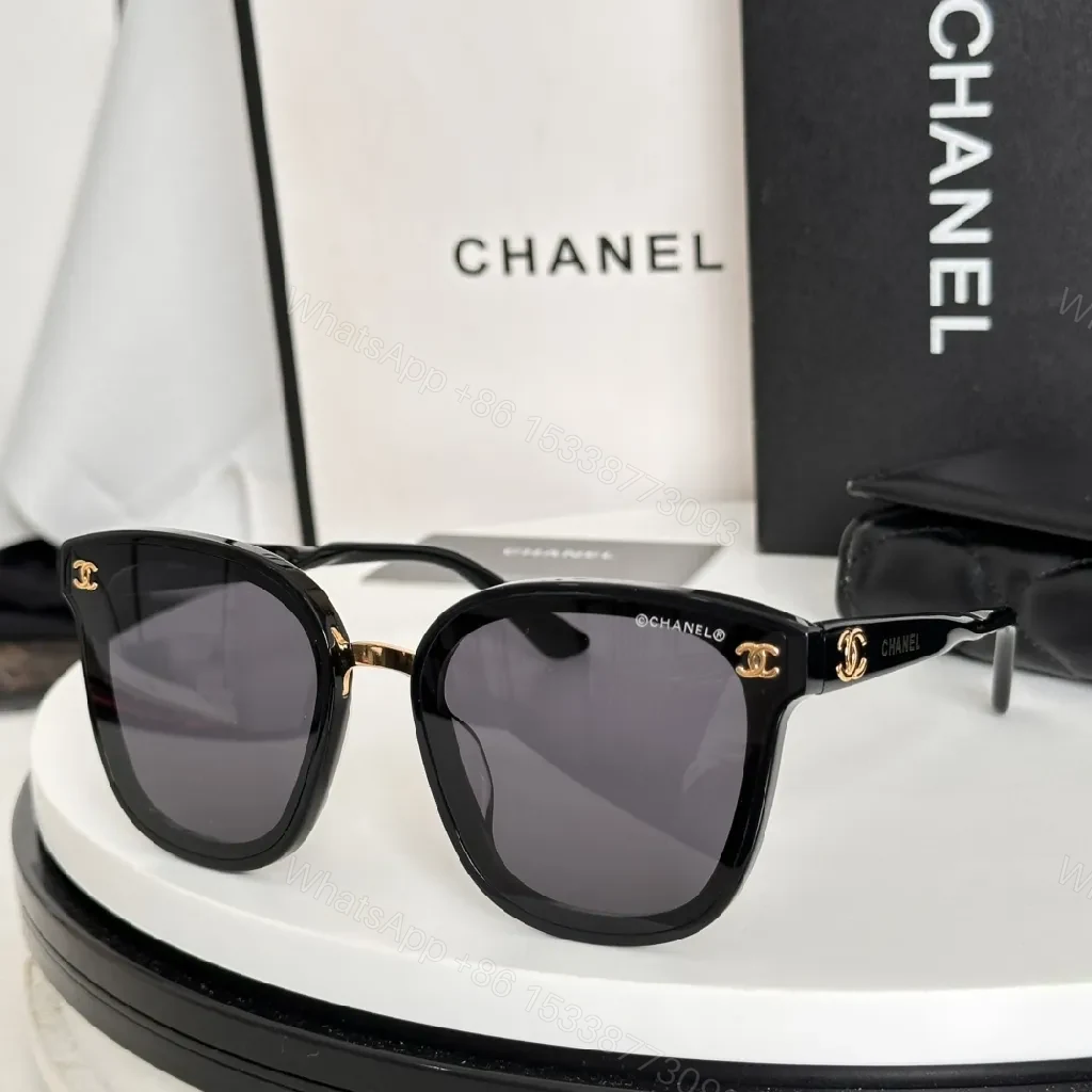 View 2 of Glossy Black Cat-Eye Sunglasses with Gold Accents & Red Temples
