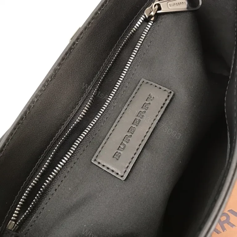 View 3 of Structured Black Burberry Crossbody: Subtle Texture, All-Day Carry