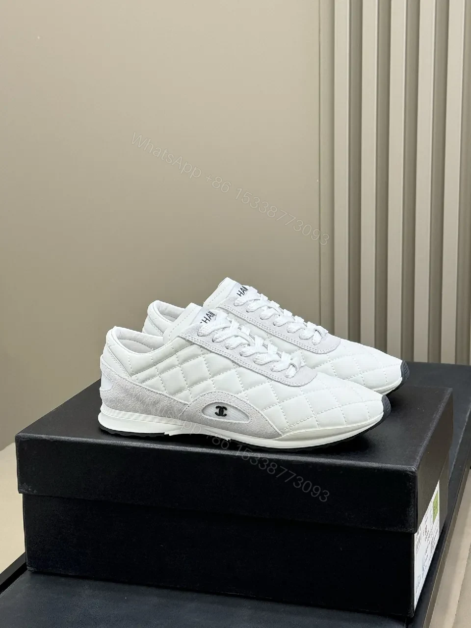 View 5 of White Quilted Leather Low-Top Sneakers with Signature Detailing