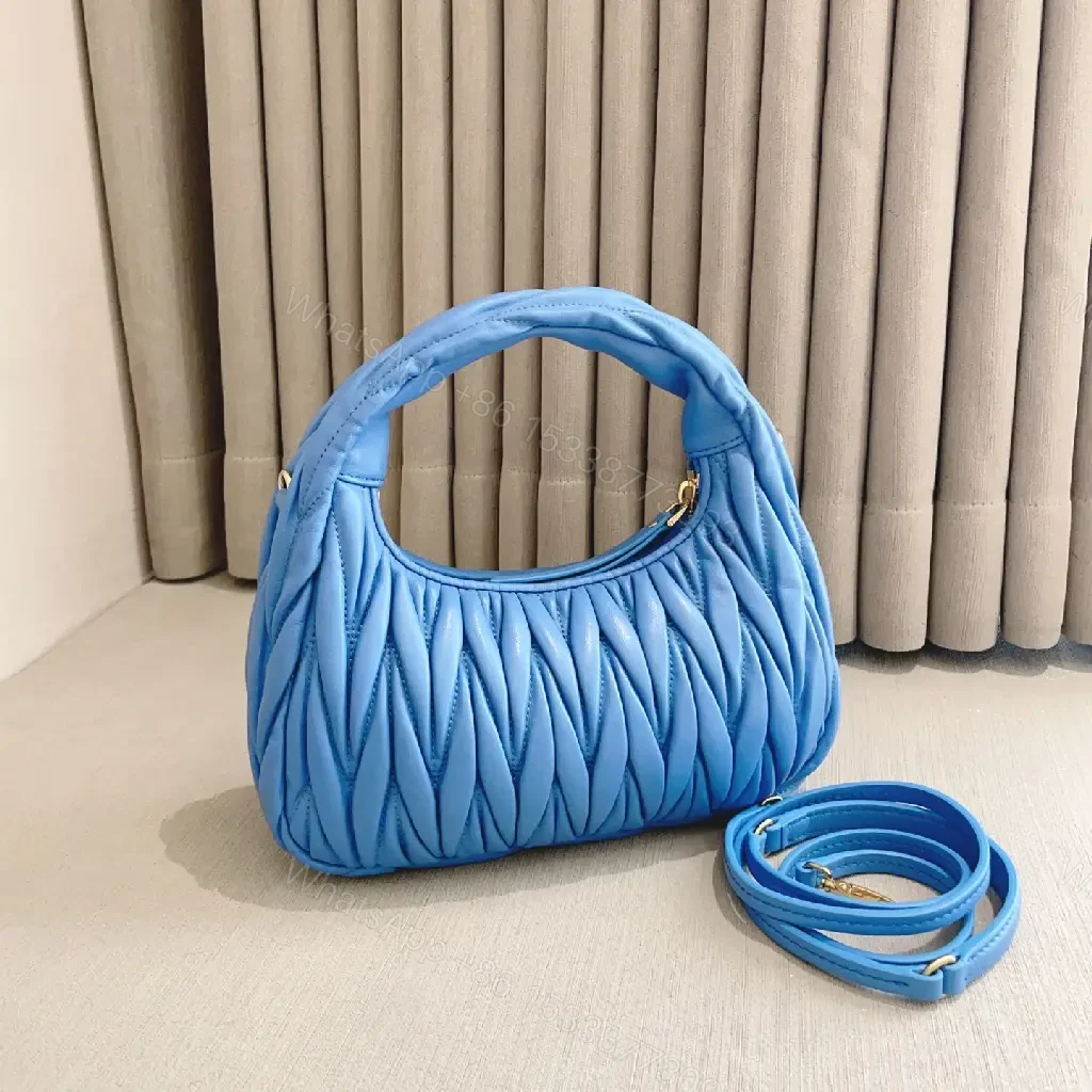 View 9 of Bright Royal Blue Quilted Crescent Handbag with Gold Miu Miu Logo