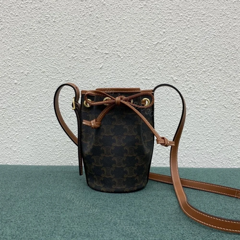View 2 of CELINE SMALL DRAWSTRING BAG IN TRIOMPHE CANVAS TAN 17CM 191142BZJ 04LU