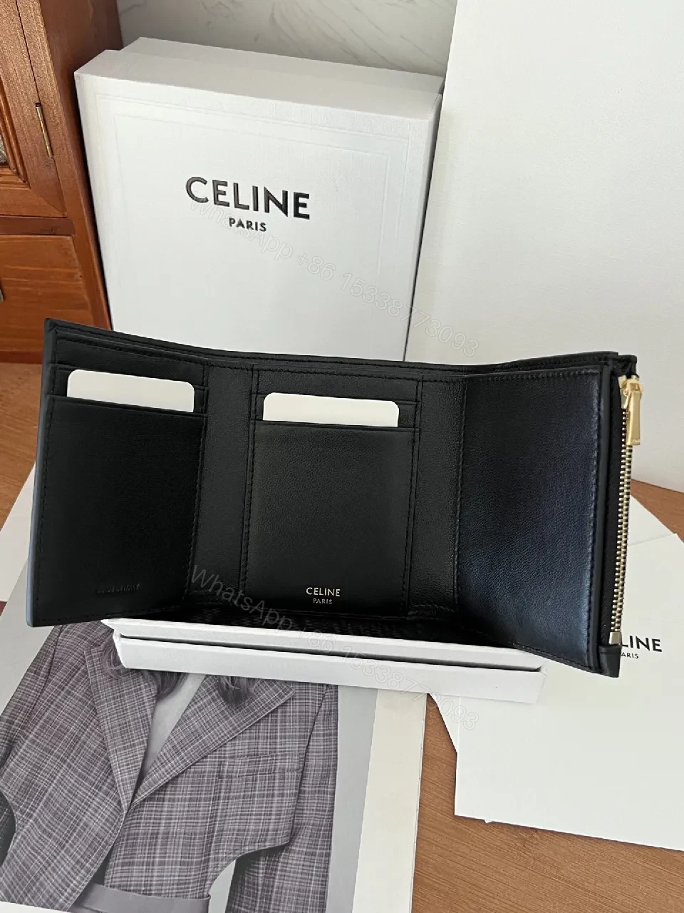 View 6 of Compact Black Leather Wallet with Gold Hardware