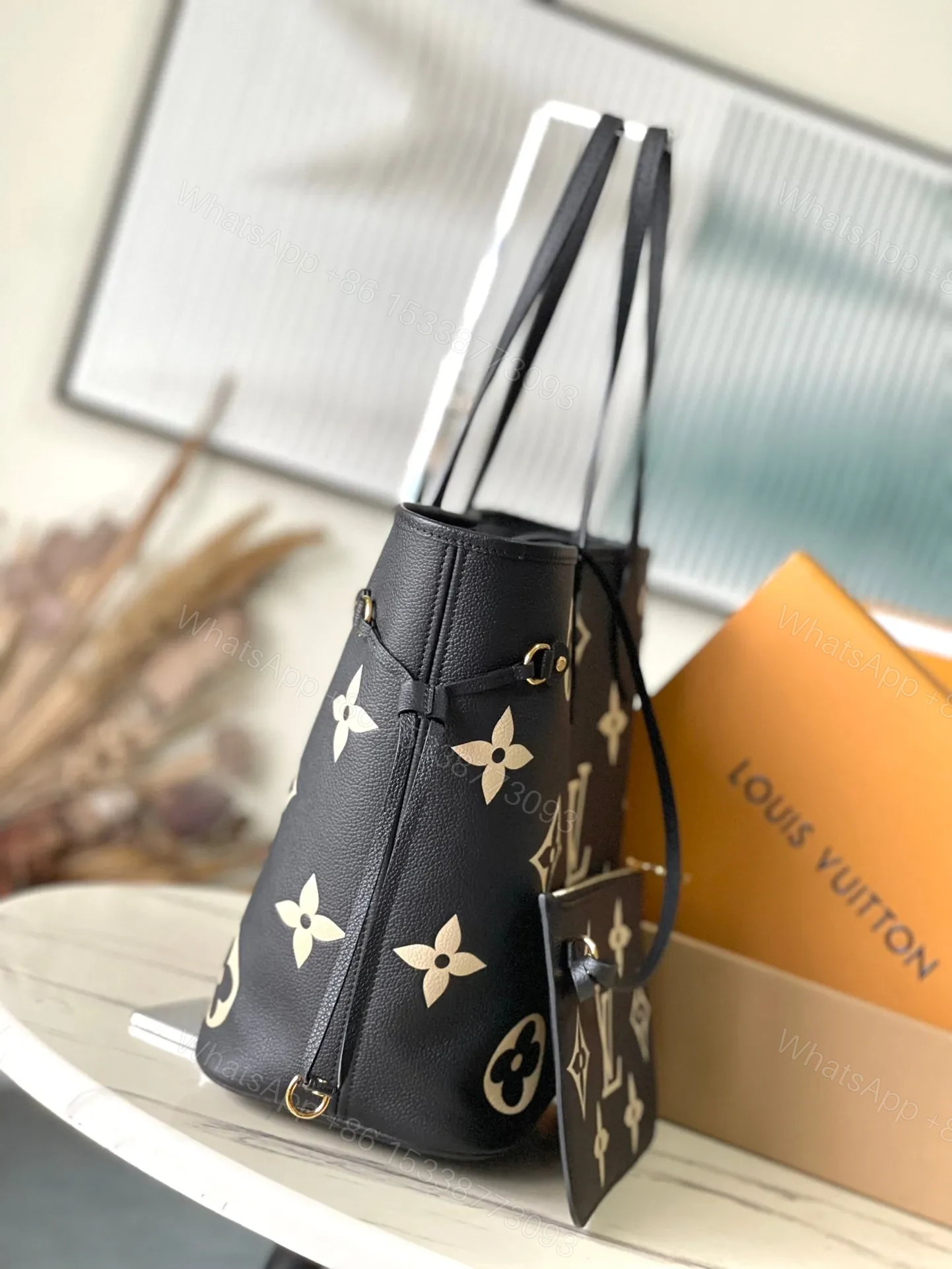 View 3 of LV NEVERFULL MM IN BLACK CREAM MONOGRAM EMPREINTE LEATHER