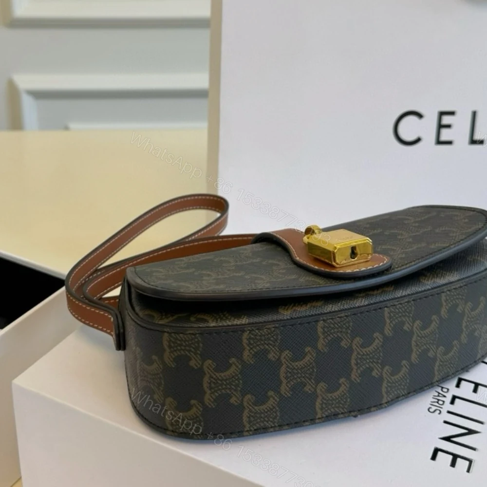 View 9 of CELINE CLUTCH ON STRAP TABOU IN TRIOMPHE CANVAS AND CALFSKIN TAN 20CM 10I592DQ2 04LU