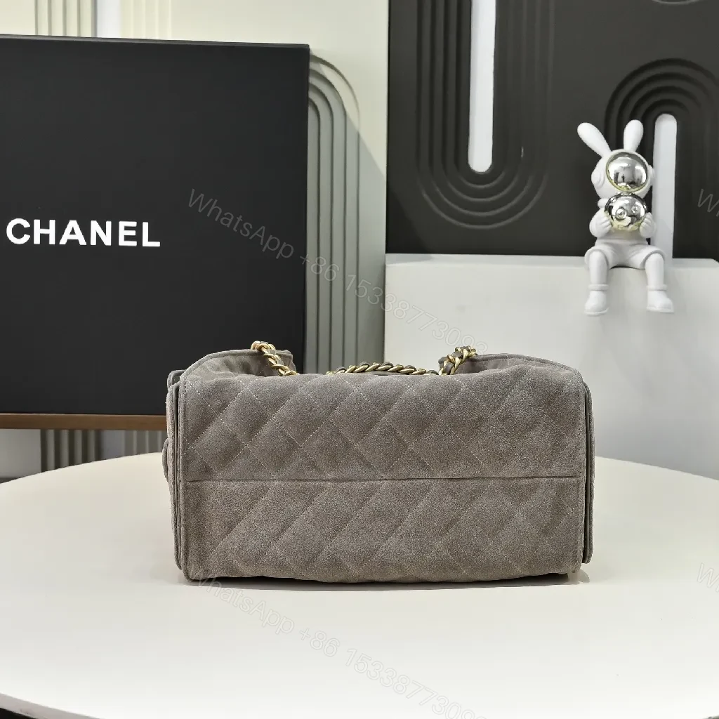 View 7 of Gray Quilted Bucket Bag with Gold Chain – Modern Texture, Everyday Versatility
