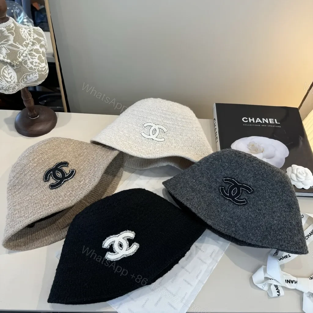 View 3 of Soft-knit White Bucket Hat with Subtle Logo Embroidery