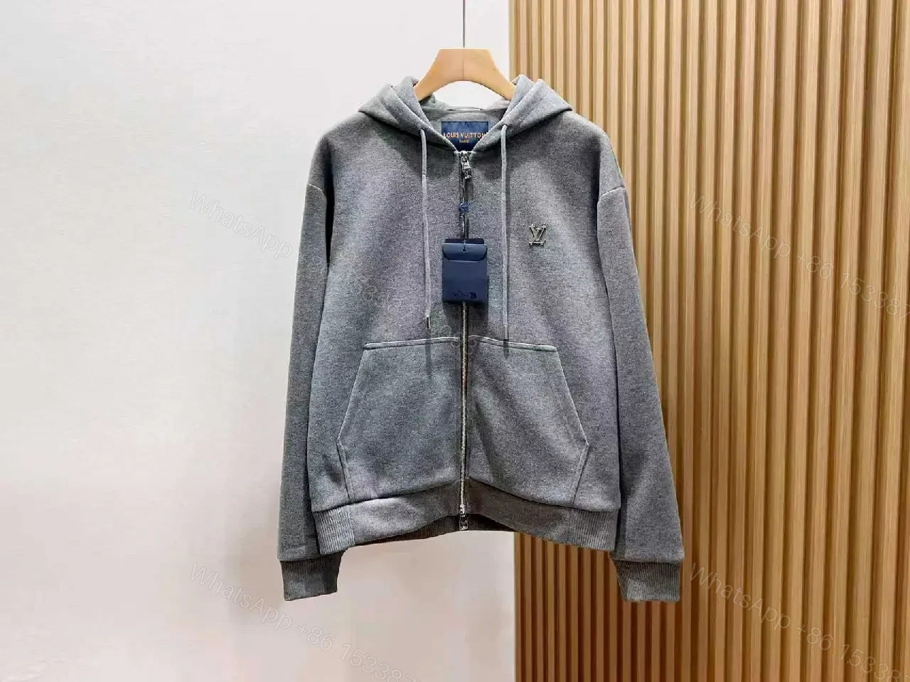 View 8 of Cozy Black Knit Zip Hoodie with Subtle Emblem Embellishment