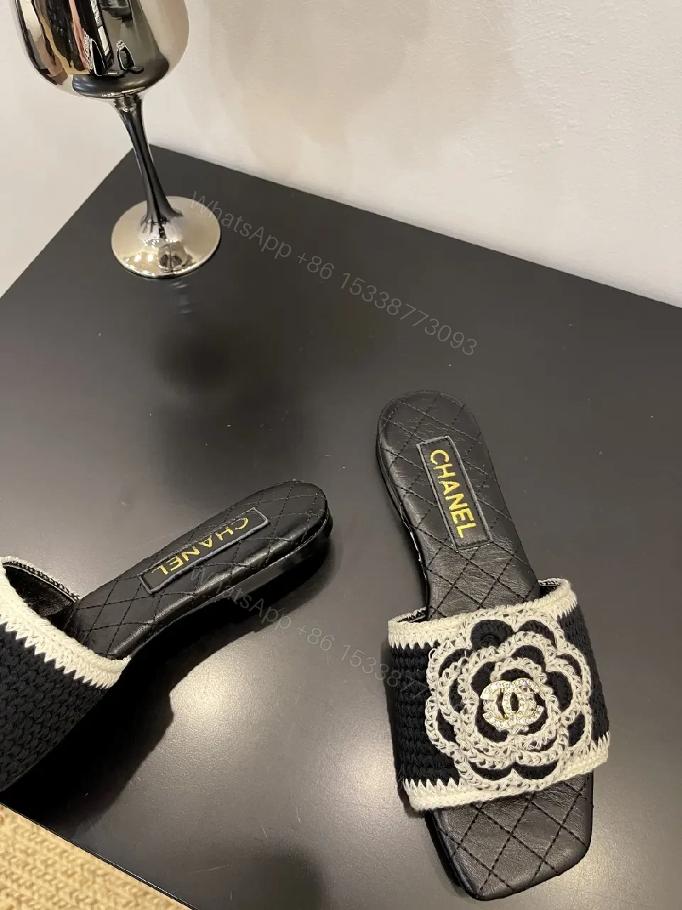 View 2 of Black Quilted Slide with Crochet Camellia Detail - Open-Toe Comfort