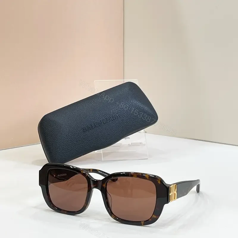 Oversized Tortoiseshell Sunglasses with Gold Accent — view 1