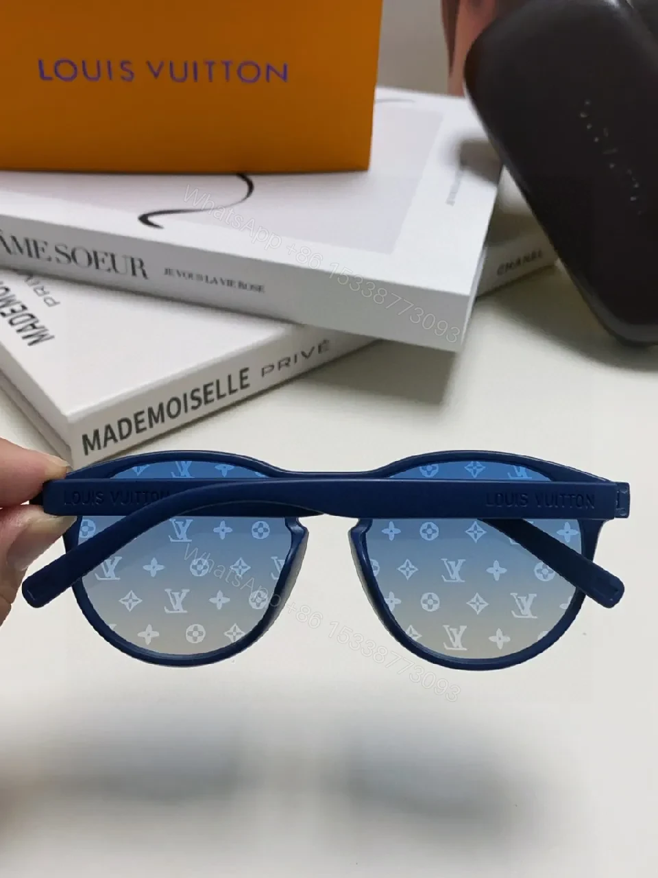 View 8 of Blue Translucent Monogram Shield Sunglasses - Oversized, UV-safe, Light-Weight Acetate