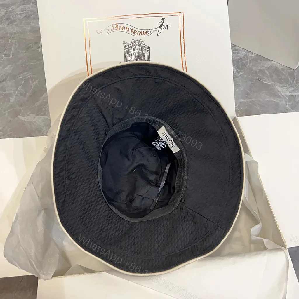 View 4 of Structured Black Straw Bucket Hat — Crystal Logo Accent, All-Season Style