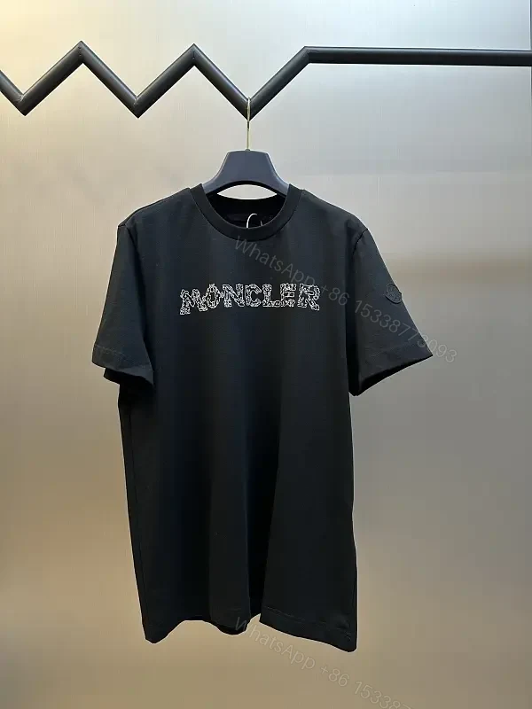 Textured Logo Black Tee with Subtle Hardware - Premium Cotton Blend — view 1