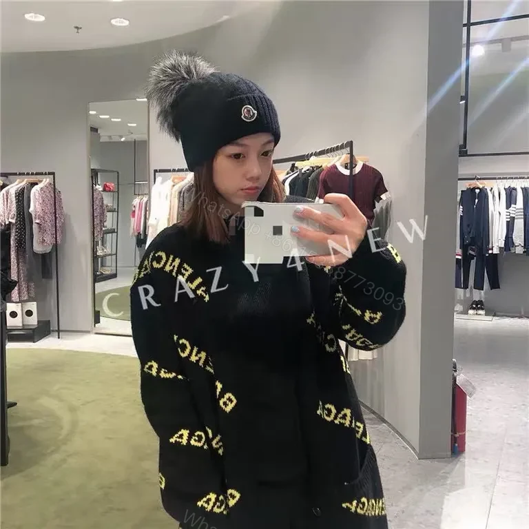 View 7 of Cozy Black Moncler Beanie: Plush Fur Pom-Pom Warm Wool-Blend Knit