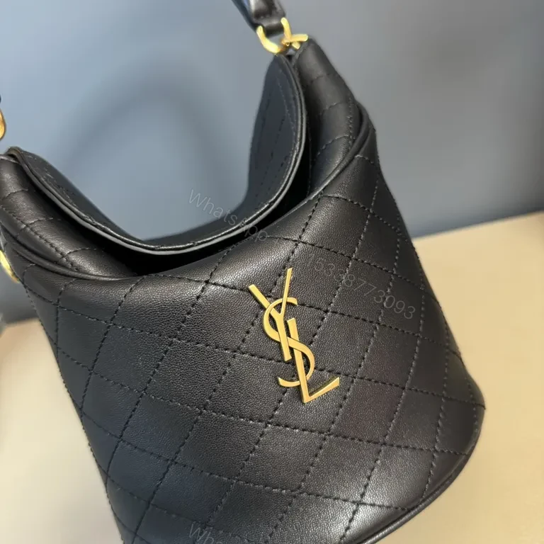 View 6 of Structured Black Quilted Bucket Bag with Gold Accents