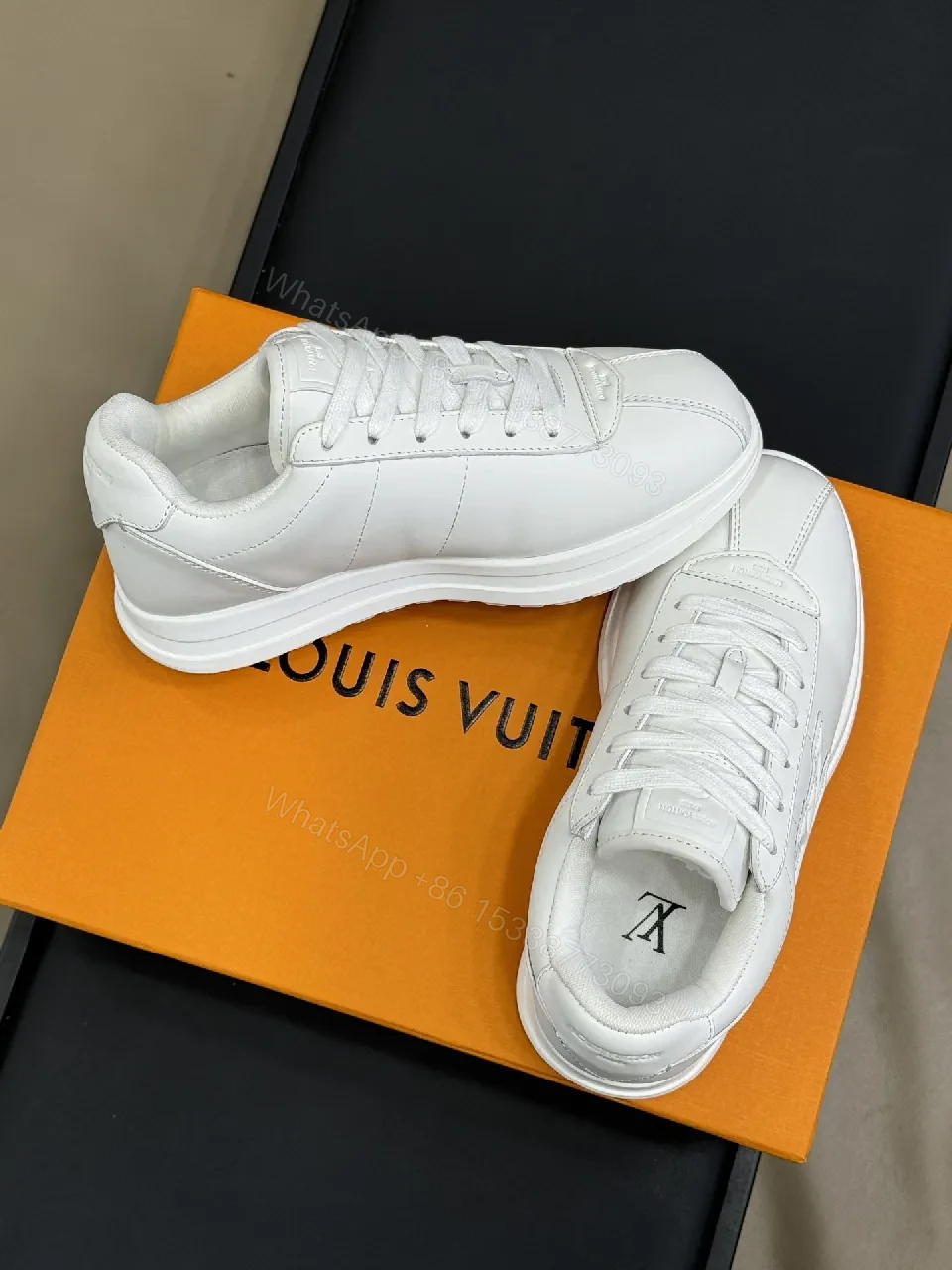 View 2 of White Leather Minimalist Sneakers with Couture Stitching