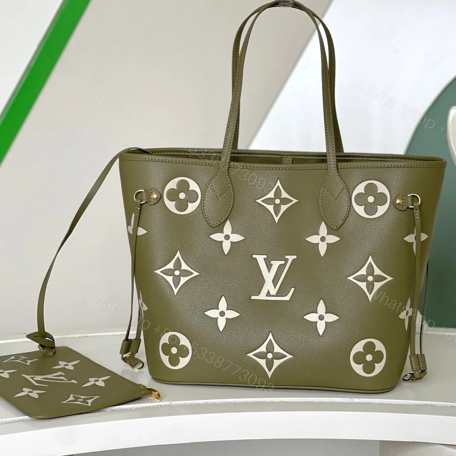 LV NEVERFULL MM KHAKI CREAM MONOGRAM EMPREINTE LEATHER — view 1
