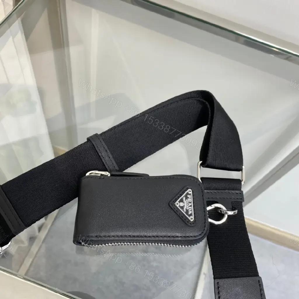 View 10 of Triangular Black Leather Belt Bag — Modern Minimalist Luxury Perforated Edge