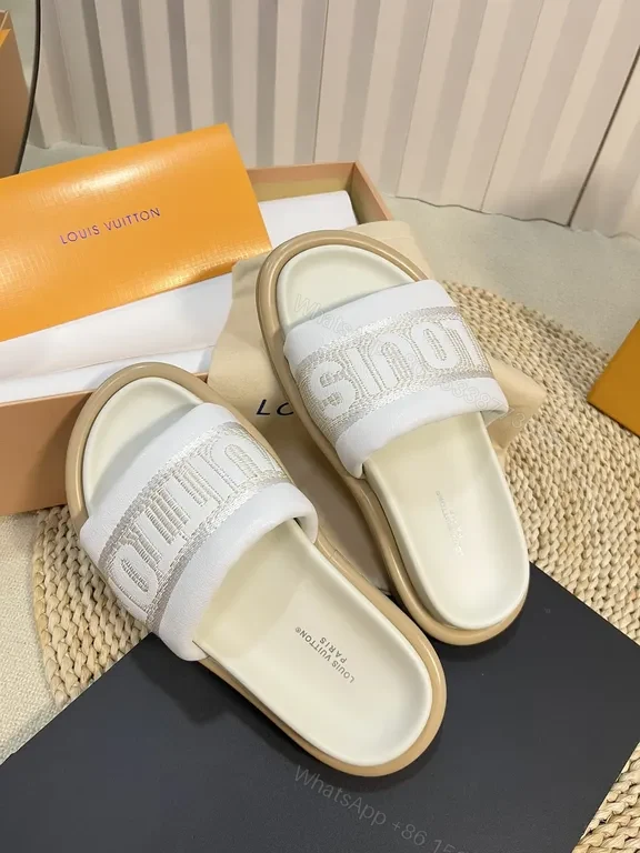 View 5 of Louis Vuitton Luxe Textured Slides with Logo Embellishment