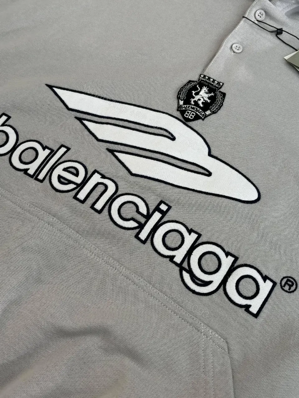View 2 of Soft-Edge Comfort Hoodie: Graphic Branding, Oversized Streetwear