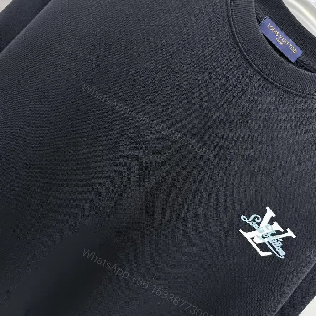 View 8 of Minimalist Black Crewneck with Subtle LV-Accent - Luxury Staple
