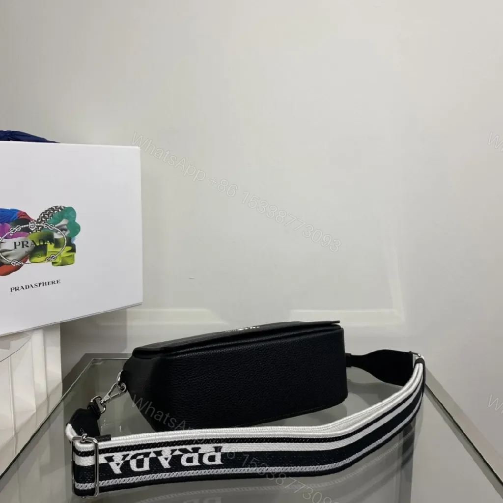 View 4 of Black Pebble-Grain Crossbody: Luxe Slim with Signature Hardware