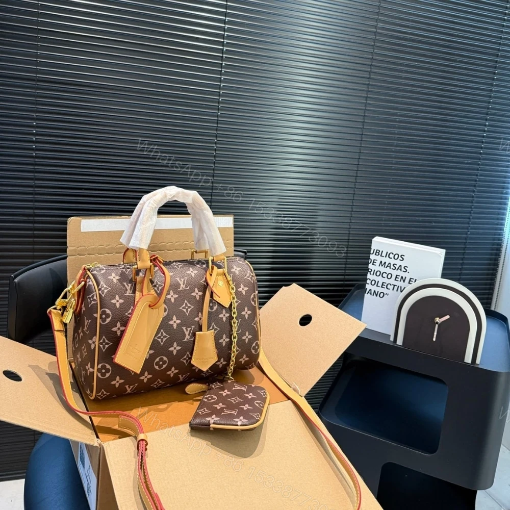 View 2 of LOUIS VUITTON SPEEDY P9 BANDOULIÈRE 25 MONOGRAM BROWN 25CM M24443