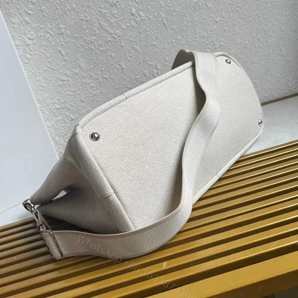 View 8 of Light Beige Canvas Tote Bag with Leather Accents and Structured Silhouette