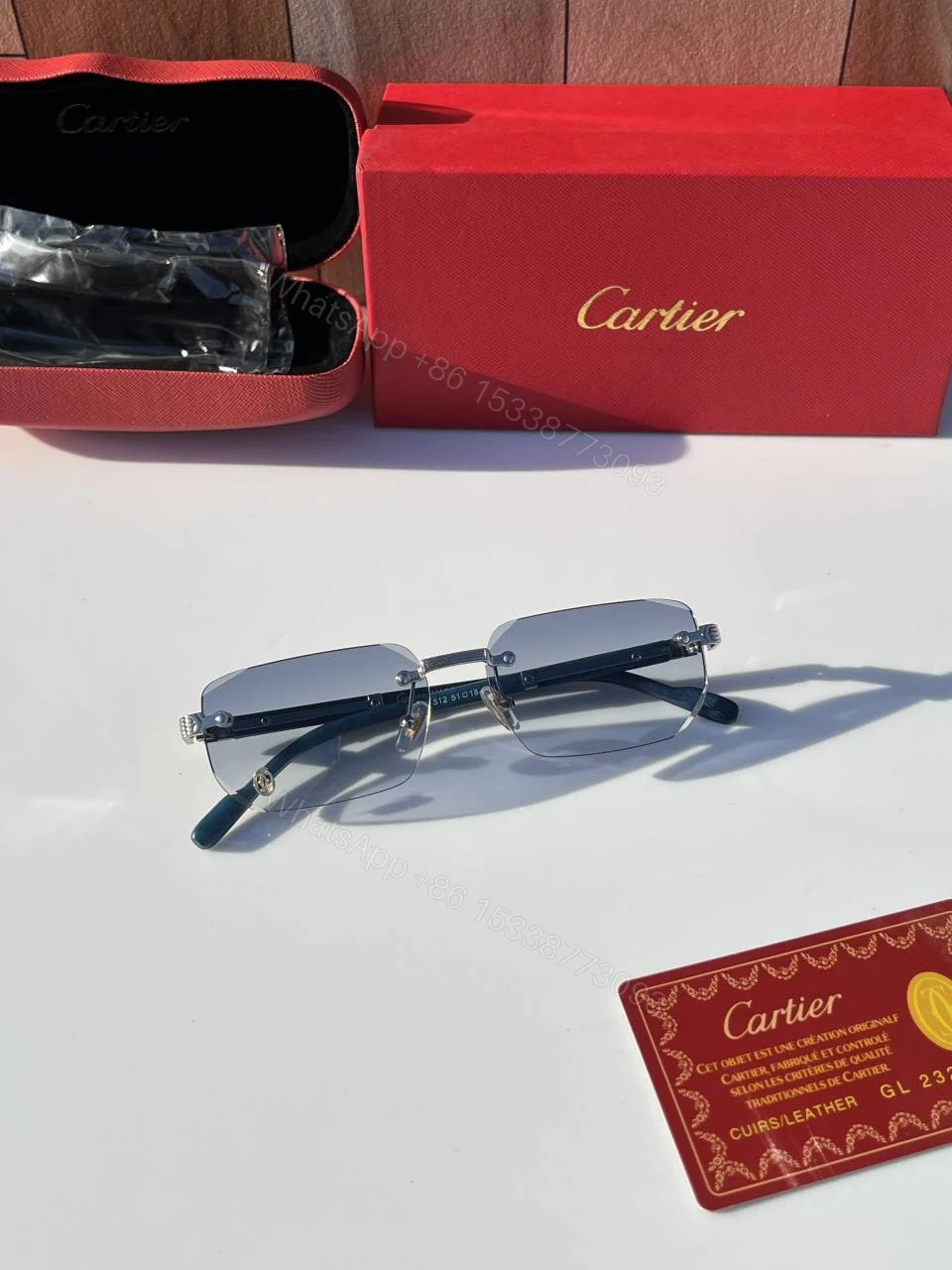 View 2 of First Copy Cartier Rimless Blue Tint Sunglasses Silver Frame Unisex UV Protection