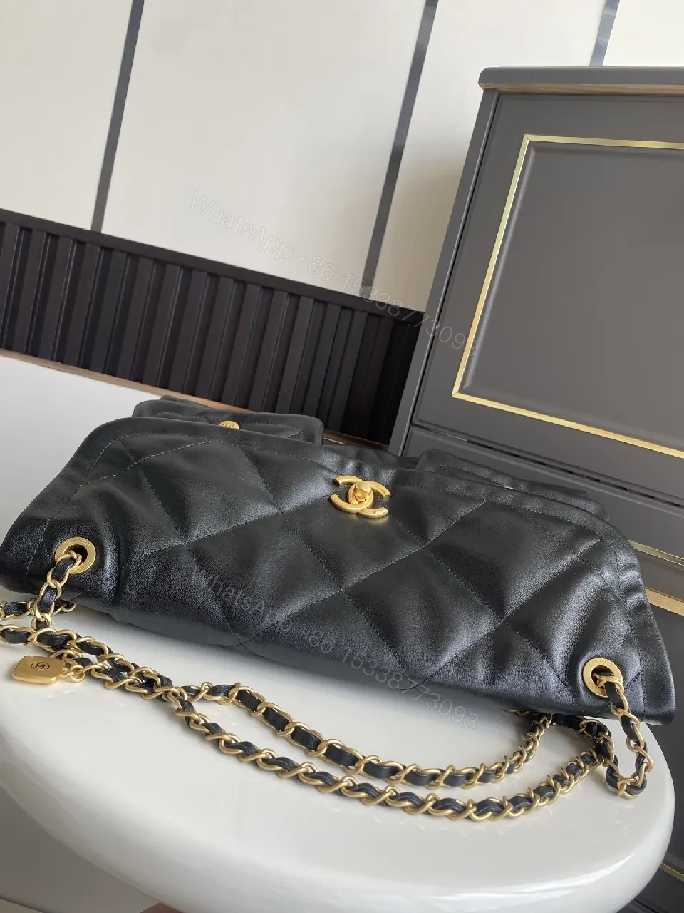 View 5 of Lux Quilted Leather Handbag in Black with Gold Hardware