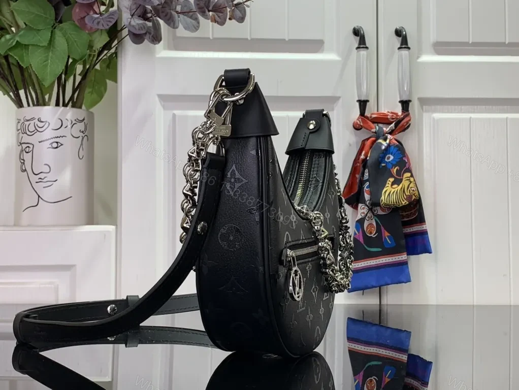 View 9 of Hologram Monogram Crescent Bag: Modern Luxury, Versatile Carry