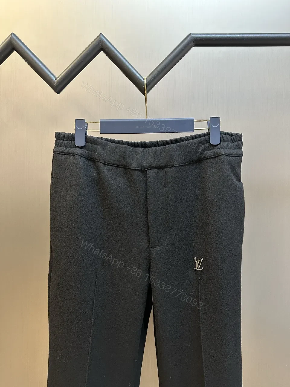 View 10 of Minimalist Tailored Trousers: Subtle LV Monogram Detail