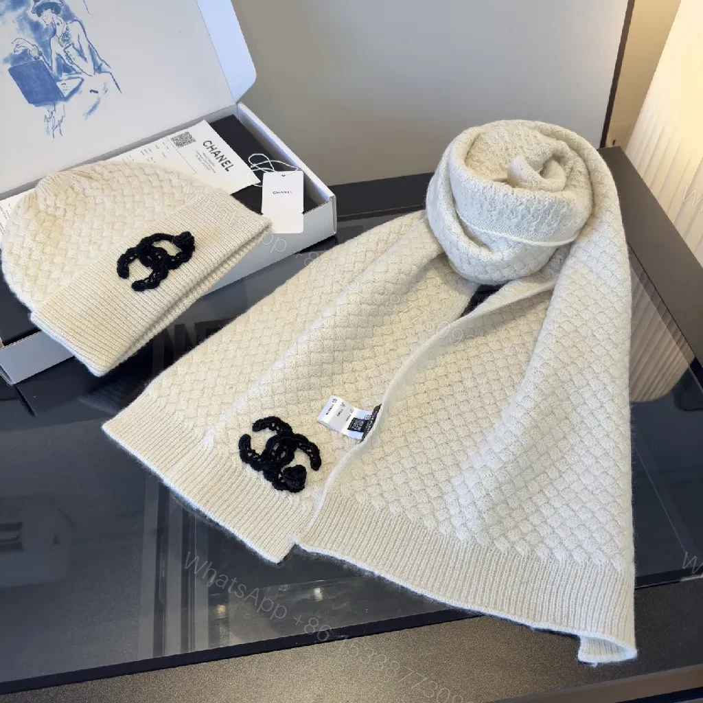View 8 of Ivory Knit Set: Textured Luxury with Iconic Emblem