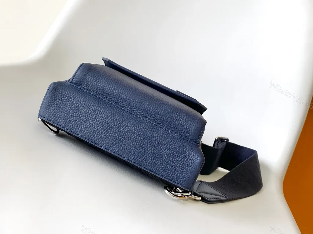 View 8 of Chic Blue Leather Compact Backpack with LV Detail