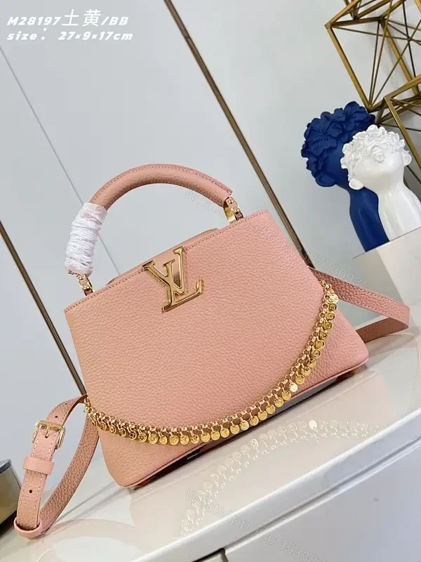 Soft Pink Textured Handbag with Gold Hardware— Elegant Everyday Luxe — view 1