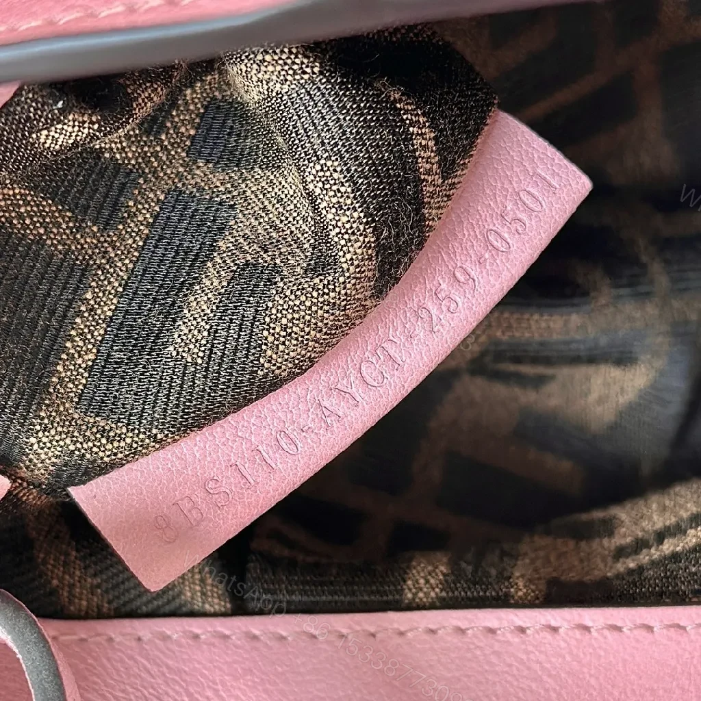 View 2 of Soft Pink Pebbled Leather Mini Satchel – Crossbody Style, Tassel Detail