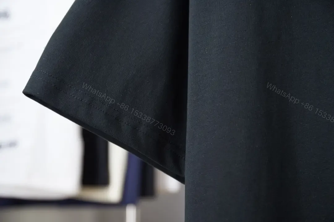 View 8 of Black Cotton Crew Tee with Subtle Crest Embroidery