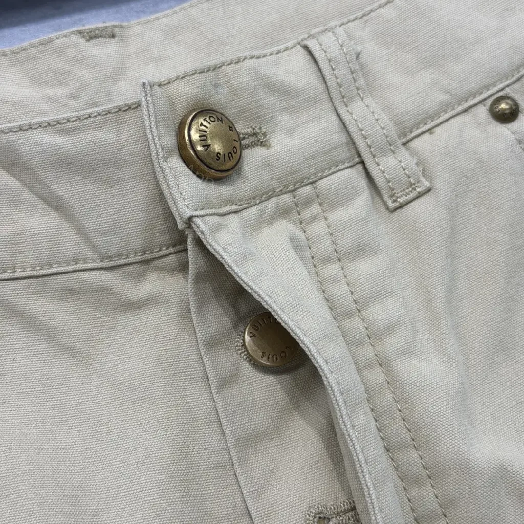 View 8 of Beige Denim-Style Shorts with LV Details, Distressed Comfort